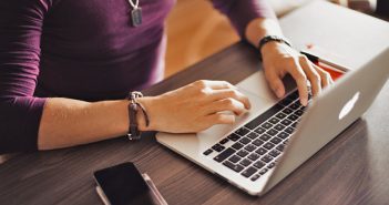 What Video Calling Software Is Best For My Business? Man on laptop - What Video Call Software Is Best For My Business?