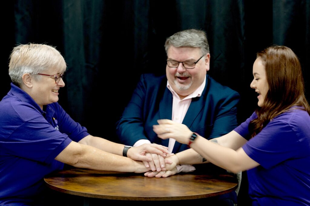 Businesses join forces to add speaker sparkle to corporate events Barry Clarke with Fiona Scott (camera left) and Lauren Roberts, both of Scott Media