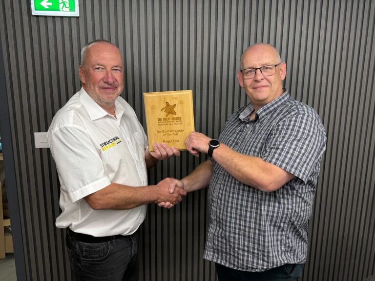 Roger Line beign presented the award by Paul Day from Filestream Document Management