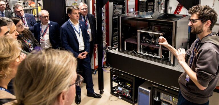 Delegates on a tour of the testbeds at the National Quantum Computing Centre.