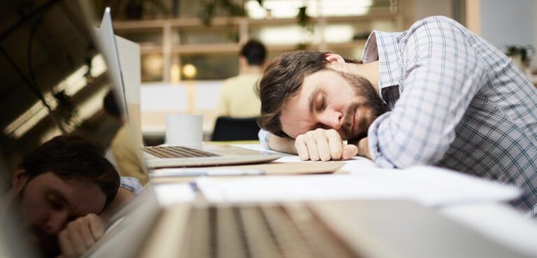 Man burnt out at desk