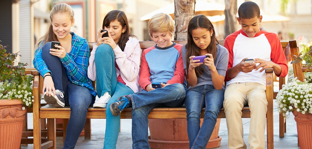 Why Starmer’s social media ban is just the tip of the iceberg Children on social media on mobile phones