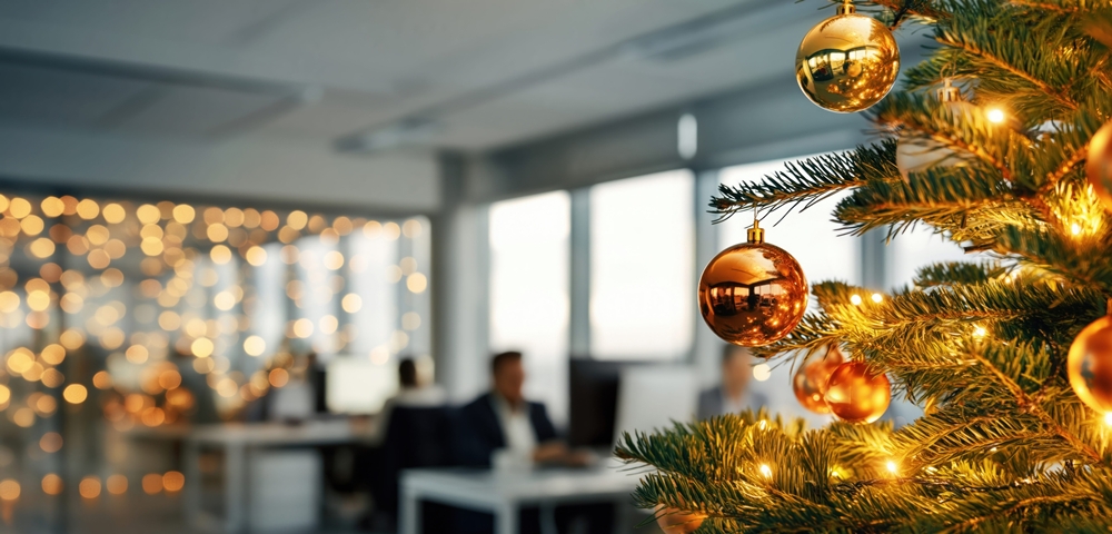 When should businesses put up their Christmas decorations? christmas tree in office -